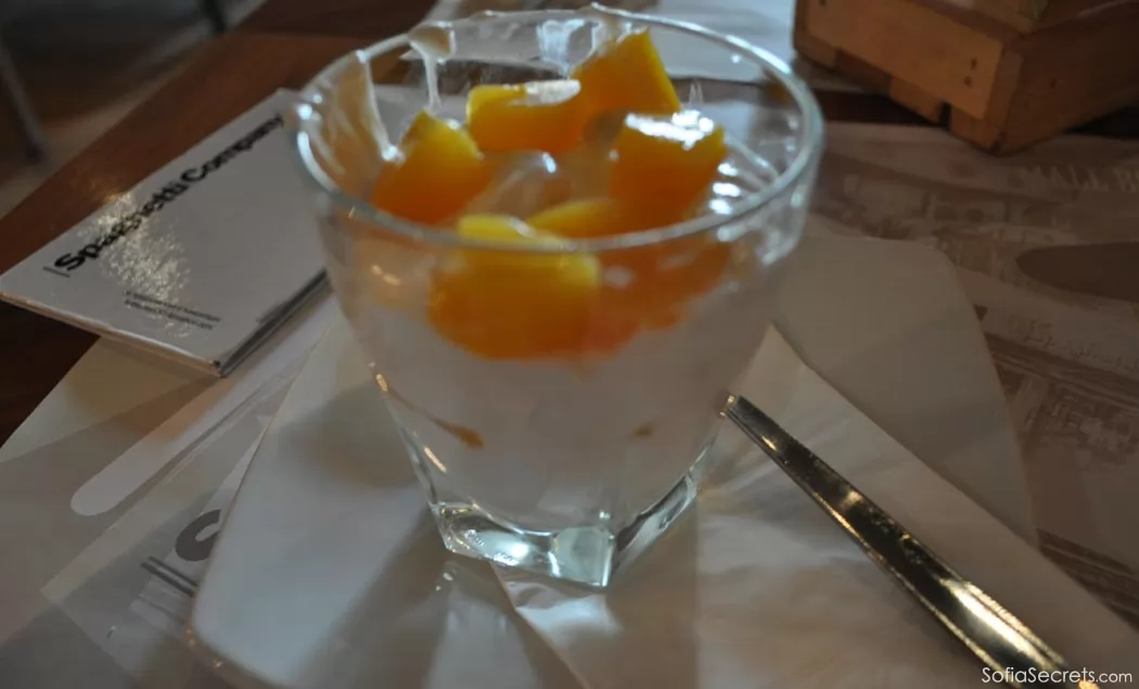 Dessert with yogurt and peaches at Spaghetti company